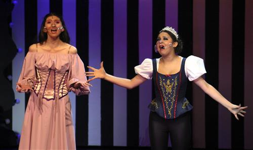 Two high school girls perform in musical 